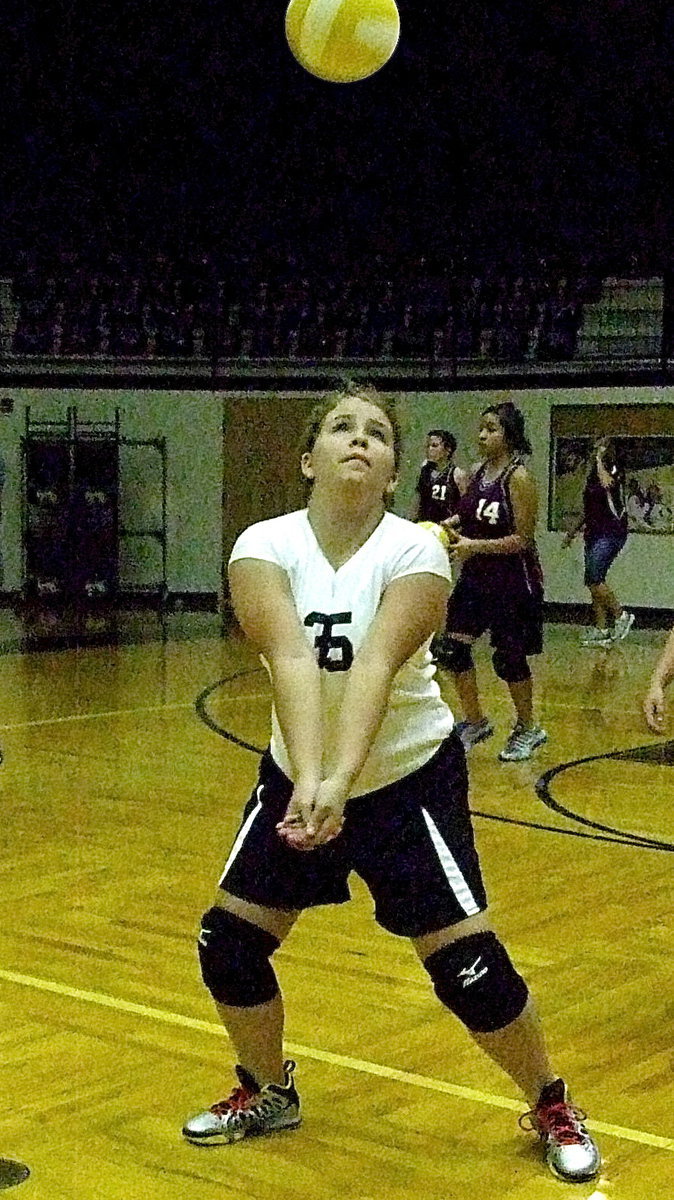 Image: Jill Varner(35) practicing bumping the ball up during warmups for Italy.