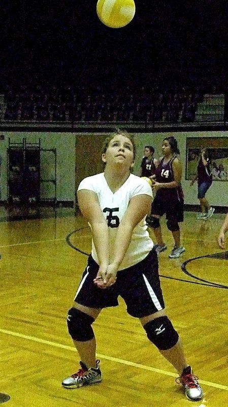 Image: Jill Varner(35) practicing bumping the ball up during warmups for Italy.