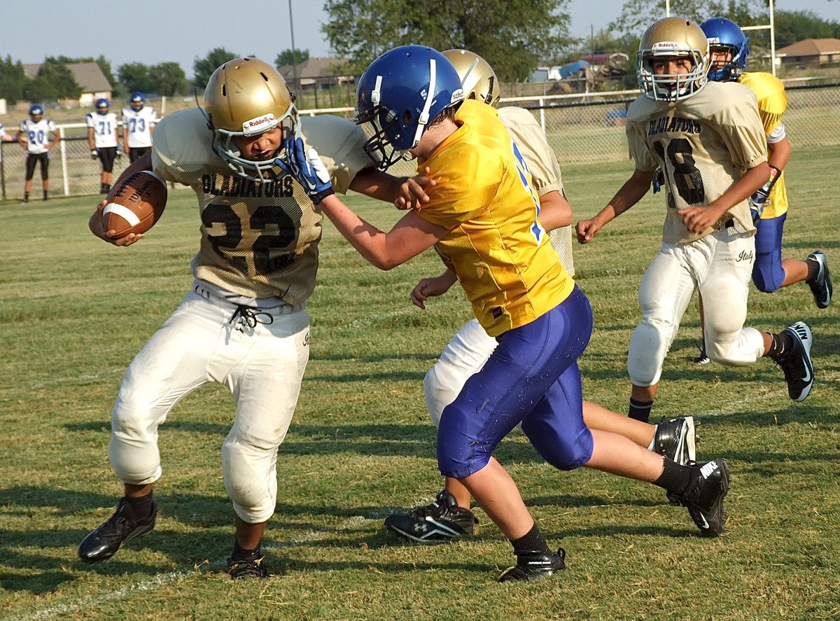Image: Jonathan Salas(22) face thru an illegal face mask and keeps on running.