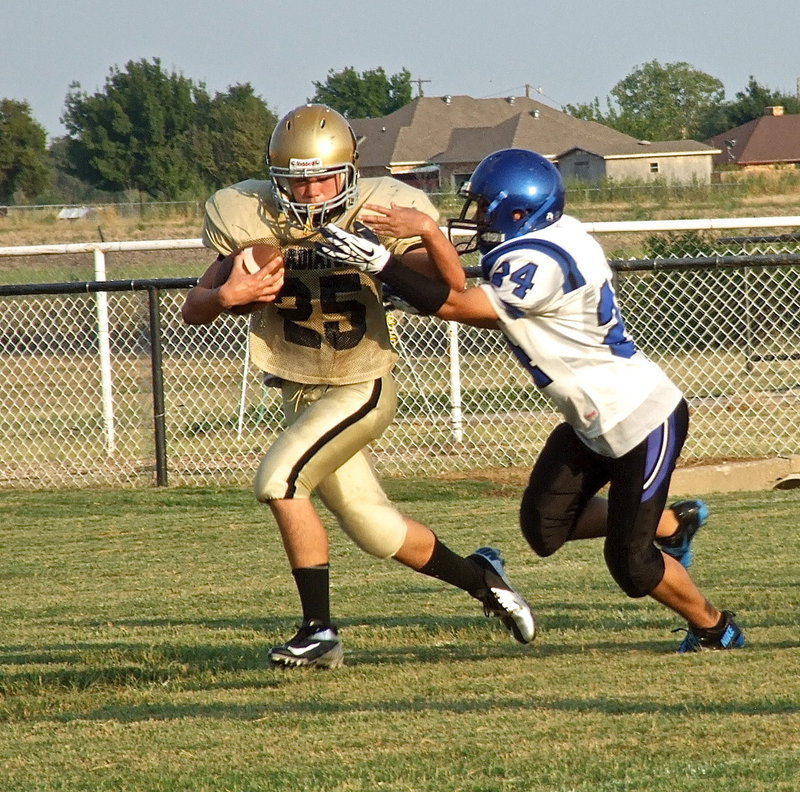Image: 8th Grade Gladiator Kyle Tindol(25) shined during his Willis Field debut for Italy by scoring a touchdown on offense and making several tackles on defense.