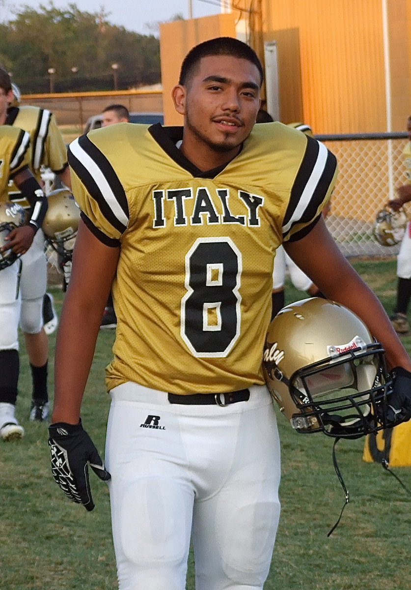 Image: Ray Salas(8) goes into battle against the Sunnyvale Raiders.