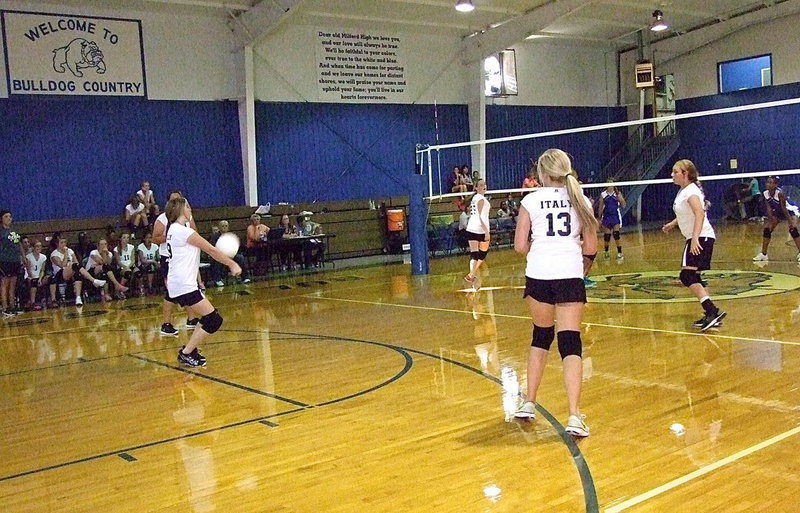 Image: Italy 8th grader Grace Haight(29) bumps the ball to her teammates.