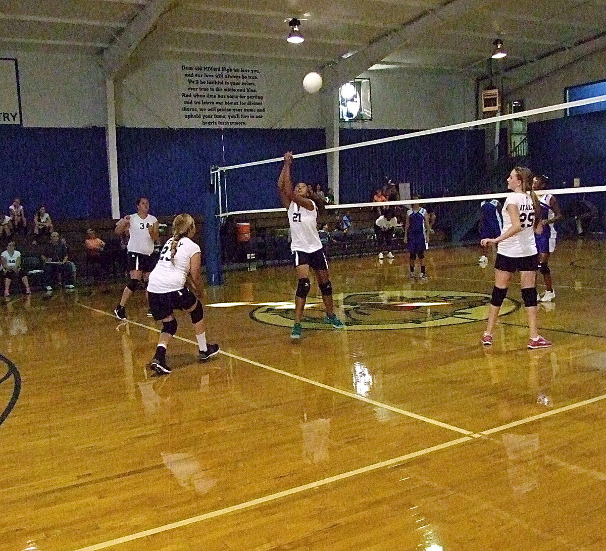 Image: Emmy Cunningham(21) shows her versatility at the net.