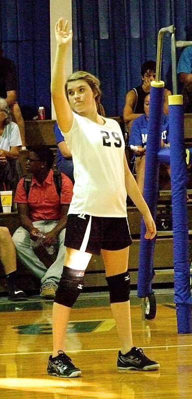 Image: Grace Haight(29) prepares for the serve from one of her teammates.