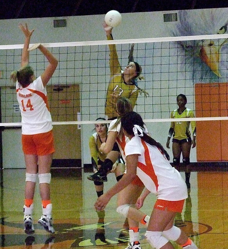 Image: Jaclynn Lewis(13) shoots back against the grain for an Italy point.