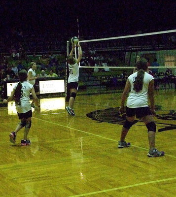 Image: Tatum Adams(21) makes a play on the ball.