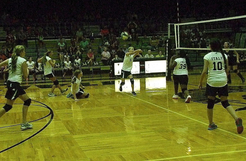 Image: Taylor Boyd(9) attempts to keep the volley going.