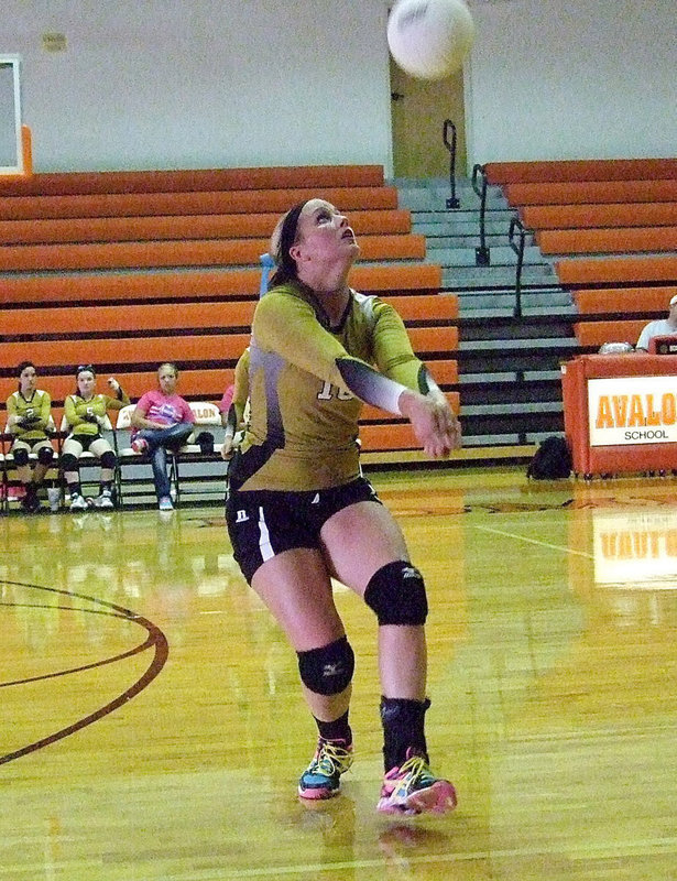 Image: Junior Lady Gladiator Madison Washington(10) tracks down a ball coming down near the boundary.