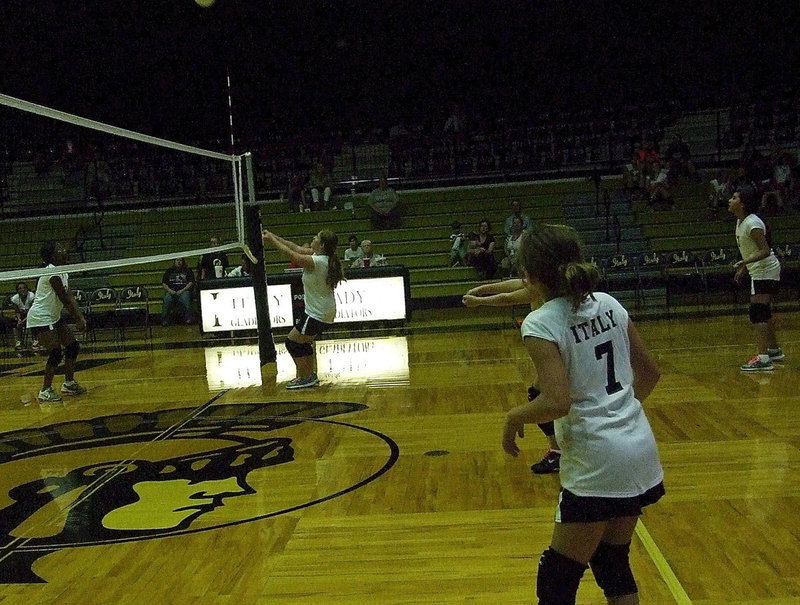 Image: Raegan Jones(38) bumps the ball over to a teammate, I mean the other Italy group on the other side…of the net…during the scrimmage. You know, the first match that Italy won…
