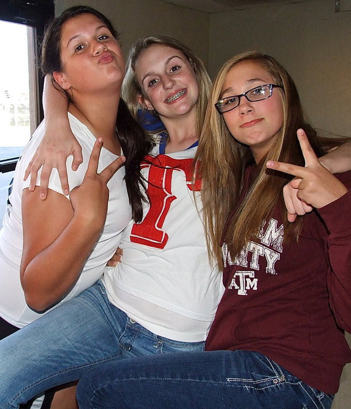 Image: Jenna Holden, Kirby Nelson and Maegan Connor hope the camera flashes before they collapse.