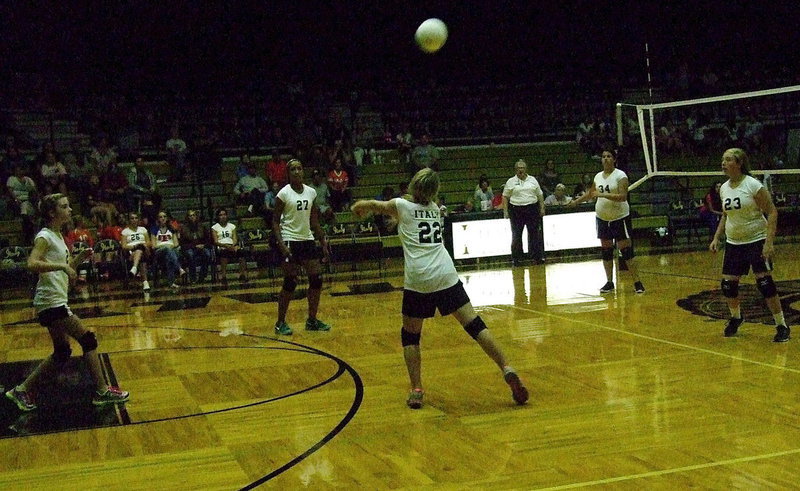 Image: Rachel Huskins(22) returns the volley to Avalon.