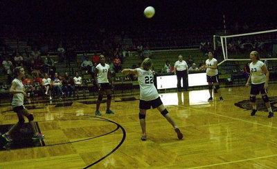 Image: Rachel Huskins(22) returns the volley to Avalon.