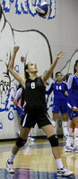 Image: JV Lady Gladiator, Jozie Perkins(8), gets on a roll while serving against the Frost JV squad.