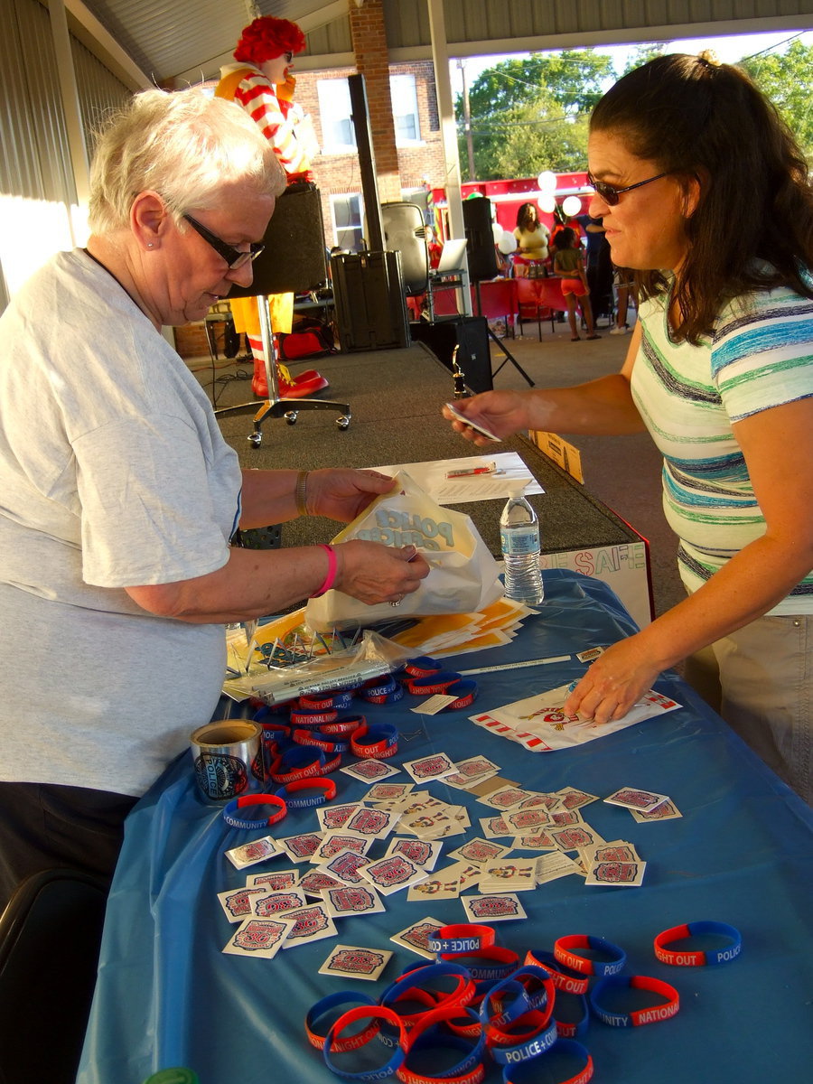 Image: Sue Lauhoff (Italy Police secretary) was busy handing out bracelets and stickers.