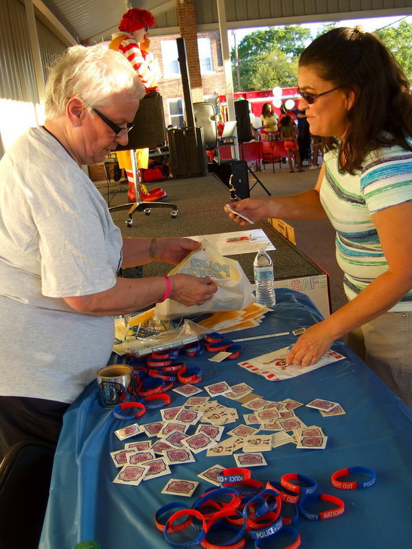 Image: Sue Lauhoff (Italy Police secretary) was busy handing out bracelets and stickers.