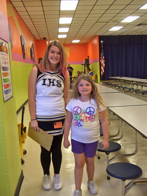 Image: Taylor Turner is escorting students to the vision bus.