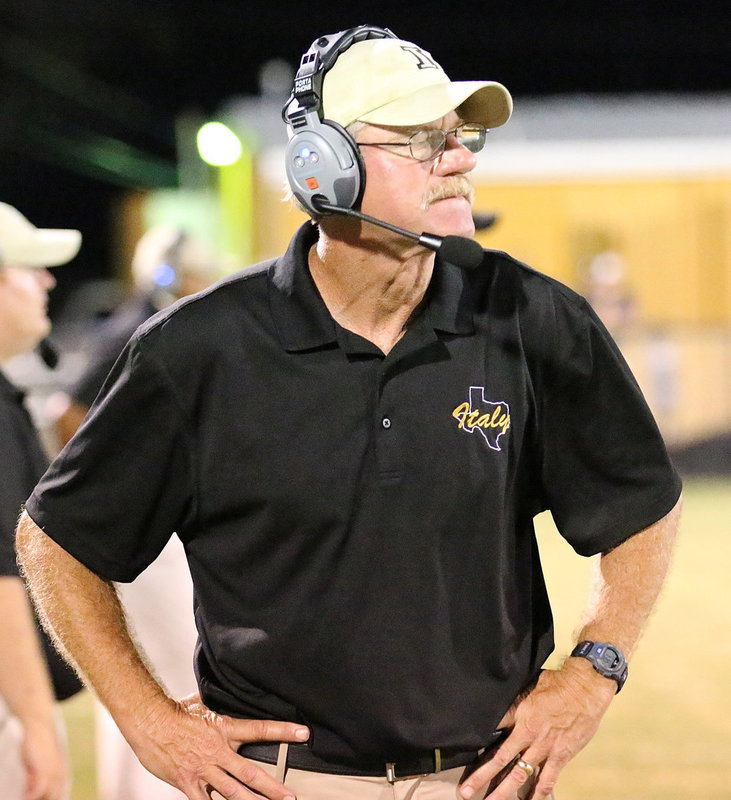 Image: Italy Gladiator head coach Charles Tindol settles in for the second-half.