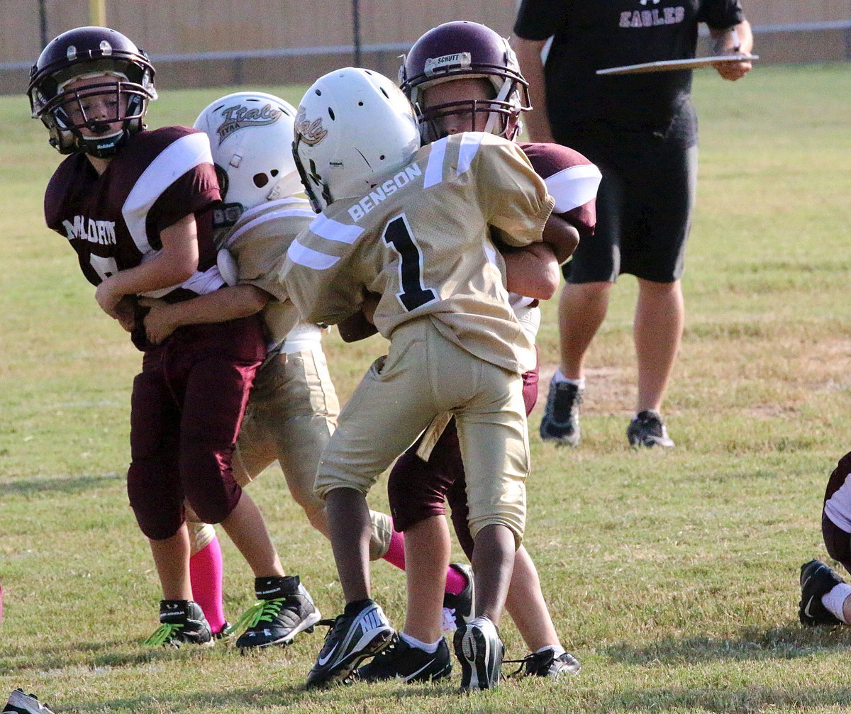 Image: Safety Curtis Benson(1) takes on an Eagle back at the line-of-scrimmage.