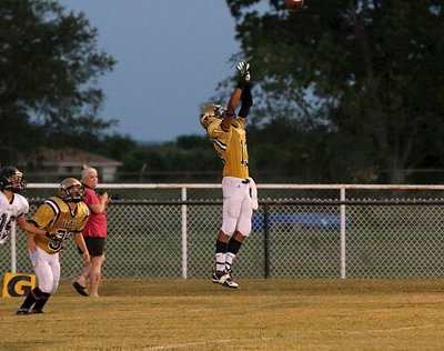 Image: Fabian Cortez(13) rises for the pick to keep the Cats grounded.