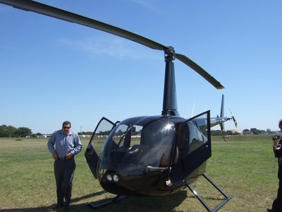 Image: Ray Bailey (pilot and owner of security company) landed the plane and is ready to pick up his guests.