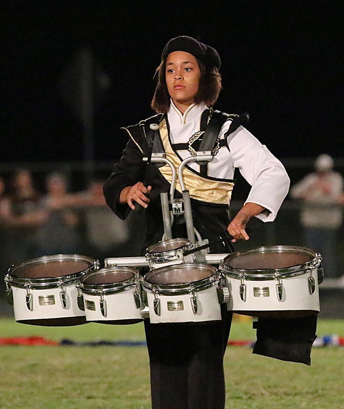 Image: Alex Minton plays tenor during the Gladiator Band’s halftime show.
