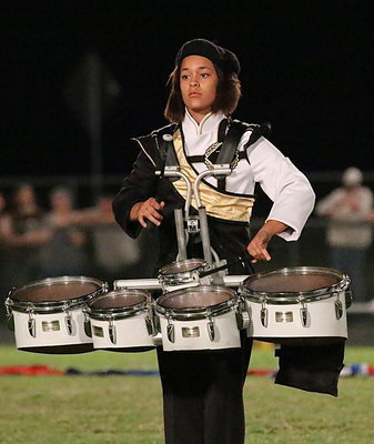 Image: Alex Minton plays tenor during the Gladiator Band’s halftime show.