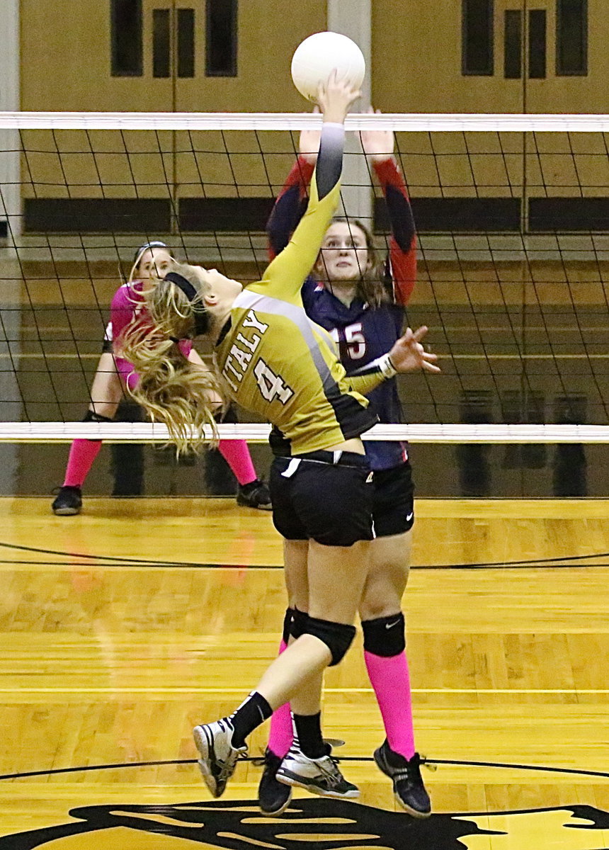 Image: Lady Gladiator Halee Turner(4) tries to power a point.