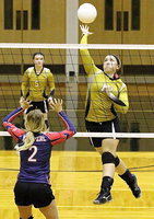 Image: Jaclyn Lewis(13) drills a dramatic kill shot that ties the 2nd set 23-23.