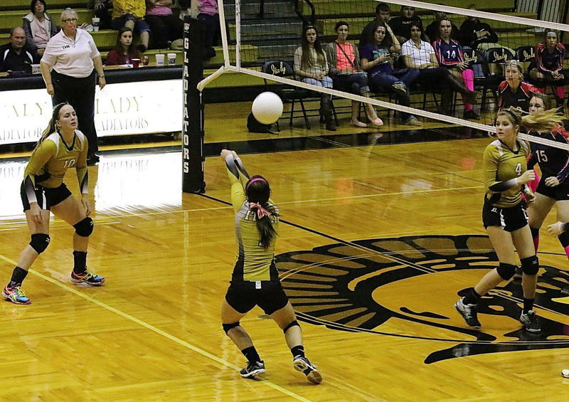 Image: Bailey Eubank(1) returns the ball back to the Lady Eagles.