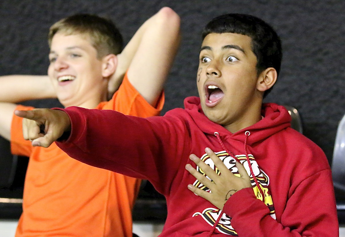 Image: James Walton and Jorge Galvan react to a play.