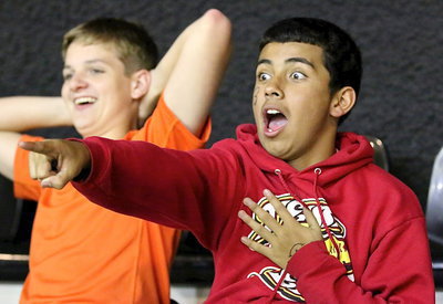 Image: James Walton and Jorge Galvan react to a play.