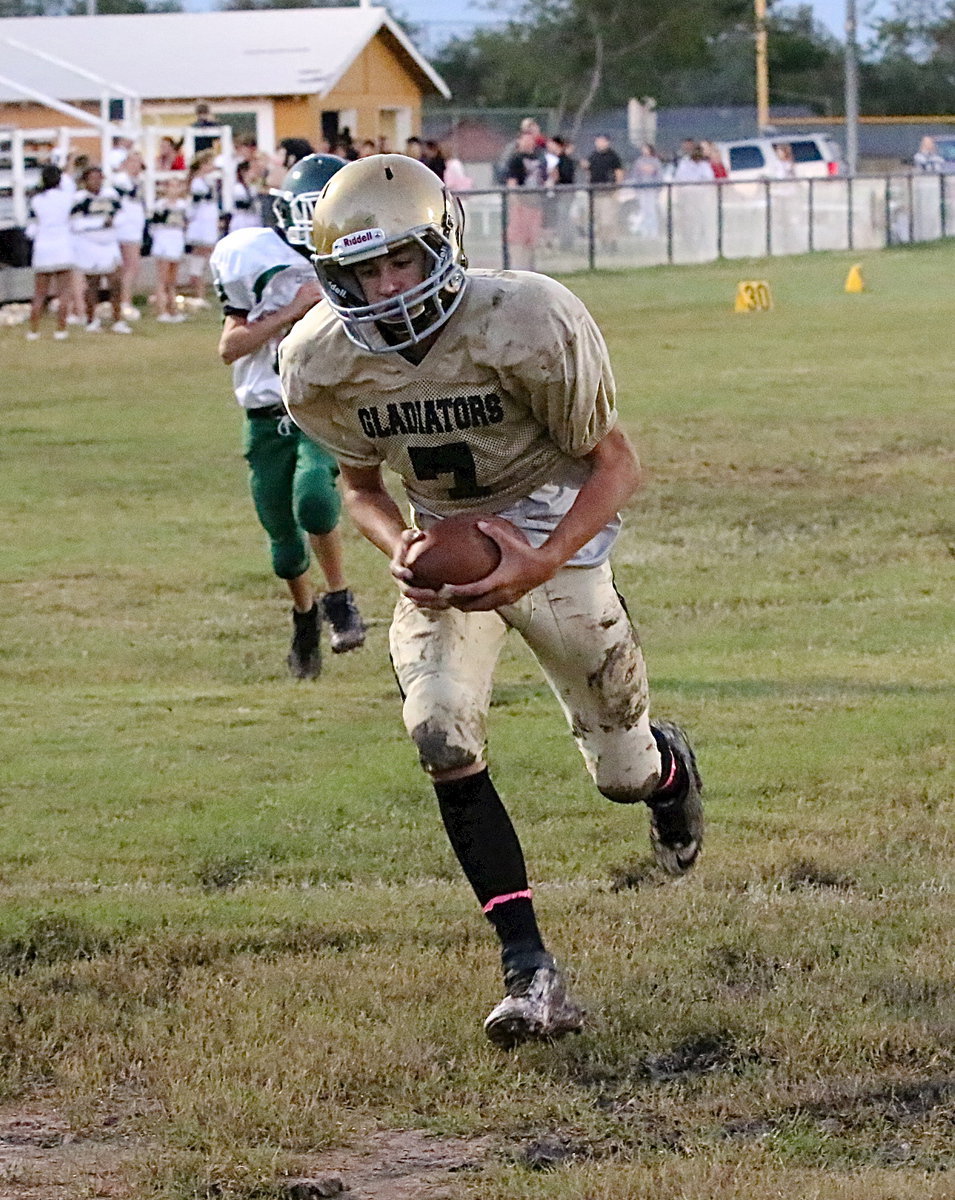 Image: Receiver Gary Escamilla(7) crosses the goal line after pulling in a pass from quarterback Tylan Wallace.