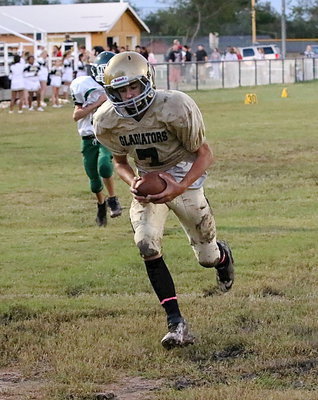 Image: Receiver Gary Escamilla(7) crosses the goal line after pulling in a pass from quarterback Tylan Wallace.