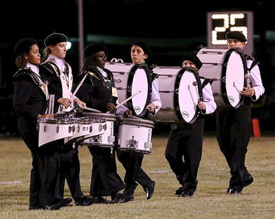 Image: The drum line gets into position as Alex Minton, Whitney Wholaver, Brenya Williams, Noah Ramirez, Tristan Smithwick and Austin Crawford set the tone.