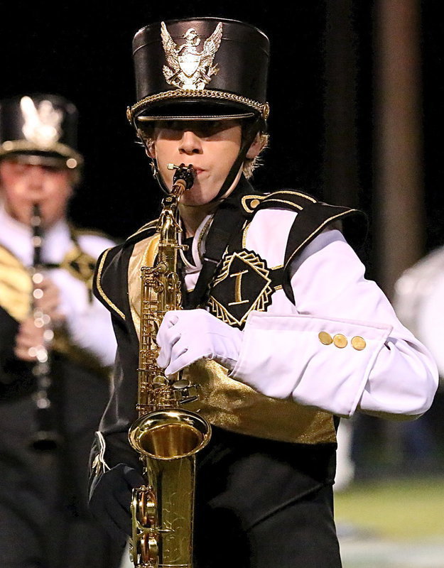Image: Michael Moore plays the sax.