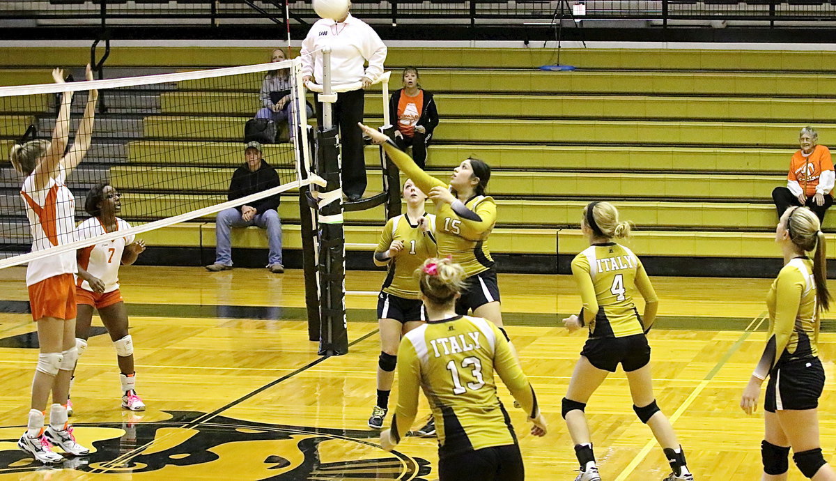 Image: Monserrat Figueroa(15) uses the Lady Gladiator attack maneuver to keep the pressure on Avalon.