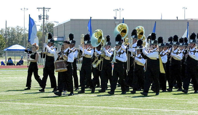 Image: Adding to the effect, Blake Brewer, is front and center as a drummer boy leading Italy’s musical troops onto the field of battle.