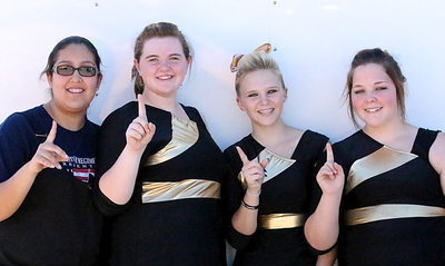 Image: Lorena Rodriguez, Kylee Dabney, Jennifer McDaniel and Sarah Burrow are proud of the band’s accomplishments.