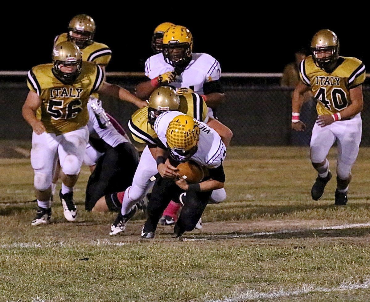 Image: Senior defensive lineman Bailey Walton(54) records a sack for the Gladiators.