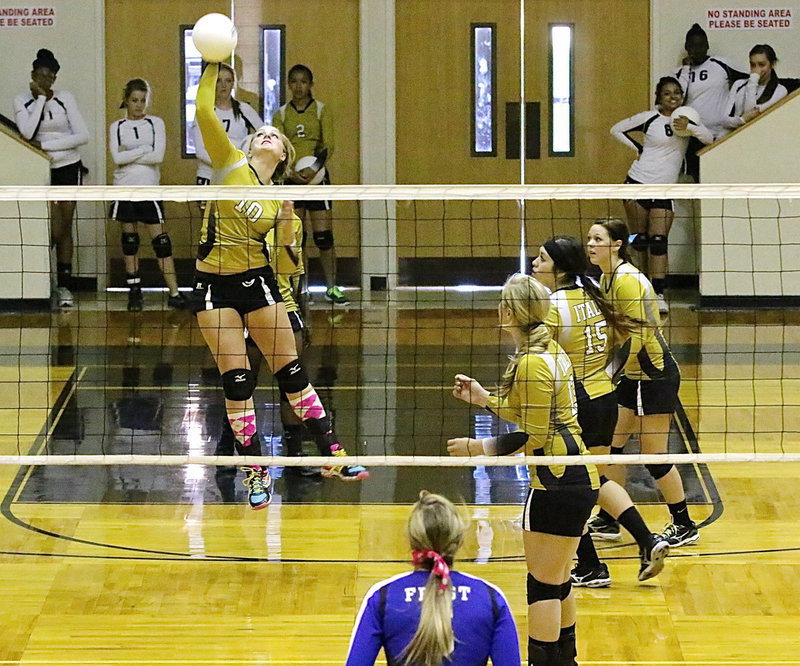 Image: Madison Washington(10) bashes the ball back to the Frost defense.