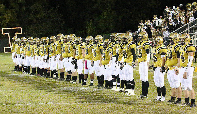 Image: The rest of the Gladiator lineup during the ceremonial pre-game coin toss.