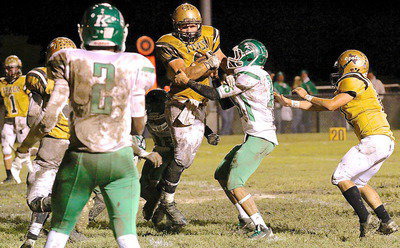 Image: Gladiator Coby Bland(40) sees the goal line and refuses to be tackled.