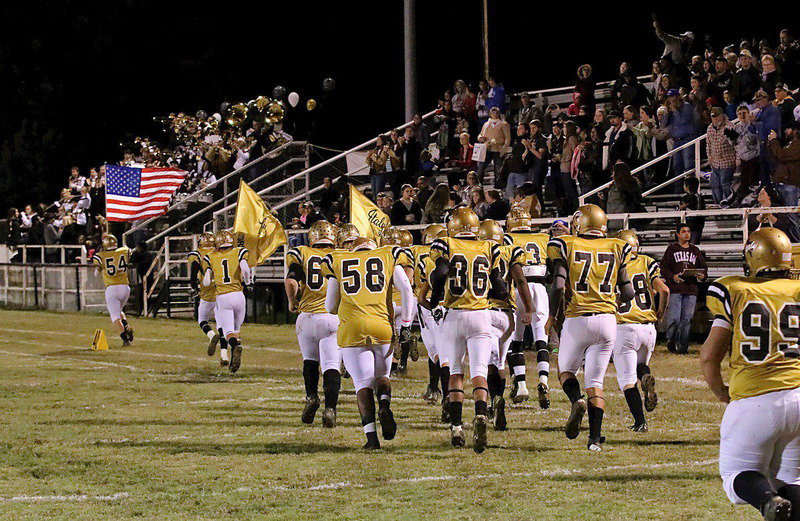 Image: The Italy Gladiators take the field to start the district matchup against the Kerens Bobcats with this past Friday night marking the final home game at Willis Field for Italy’s seniors.