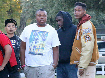 Image: Marcos Duarte and Gladiator seniors Darol Mayberry, TaMarcus Sheppard and Tre Robertson are ready to bite into bi-district burgers.