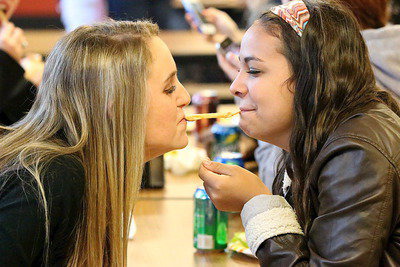 Image: Ladies and the champs. Lady Gladiators Kirby Nelson and Ashlyn Jacinto join the varsity football boys for a champions’ cookout.