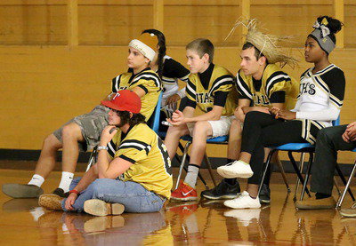 Image: Kyle Fortenberry, Levi McBride, Clayton Miller, Ryan Connor and K’Breona Davis watch the senior slide presentation.