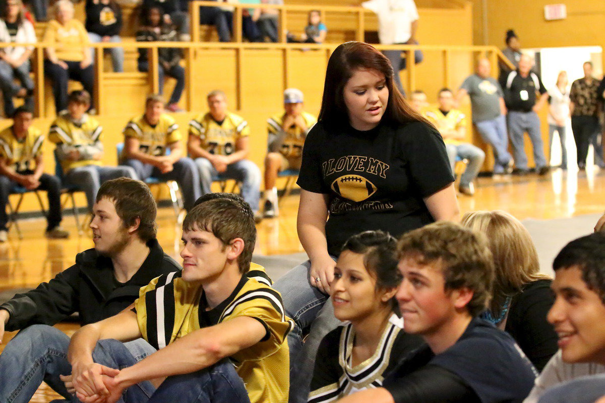 Image: Senior Paige Westbrook runs the senior slide show.