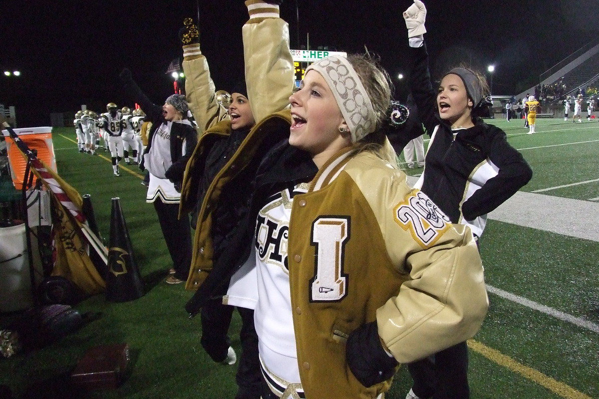 Image: Britney Chambers, Ashlyn Jacinto, Maegan Connor and Paige Little keep the spirit up on the sidelines.