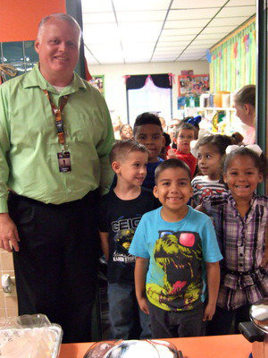 Image: Jonathan Nash (principal) lined up with the students!