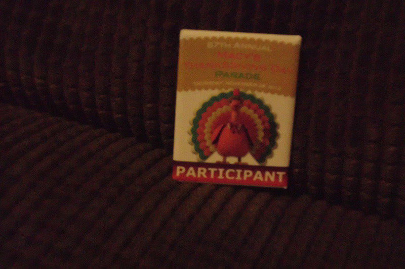 Image: Taylor’s Macy’s Thanksgiving parade participant’s pin.